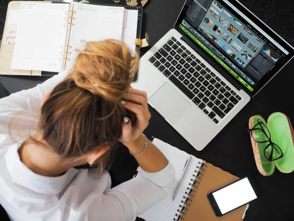 Picture of a concerned person wanting a pay rise for her IT job in Dublin but not knowing how to ask.